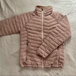 Puffy, pale-pink Columbia jacket.